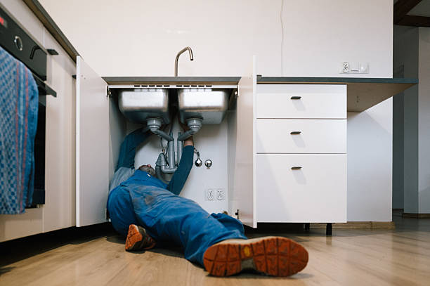 Professional Drain Cleaning technician working in Claremont, CA